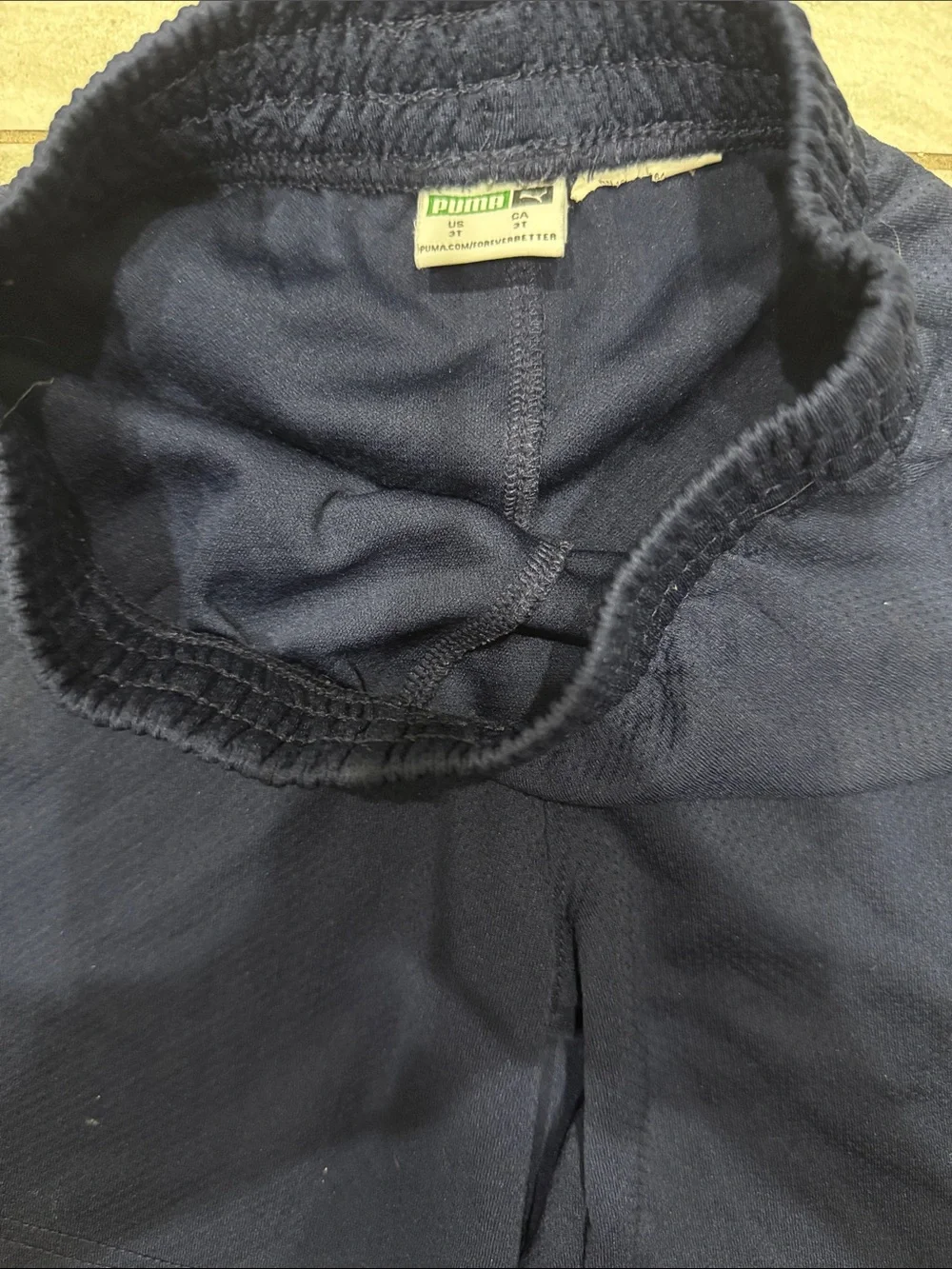 Puma Kids Navy Shorts with Red Puma Logo